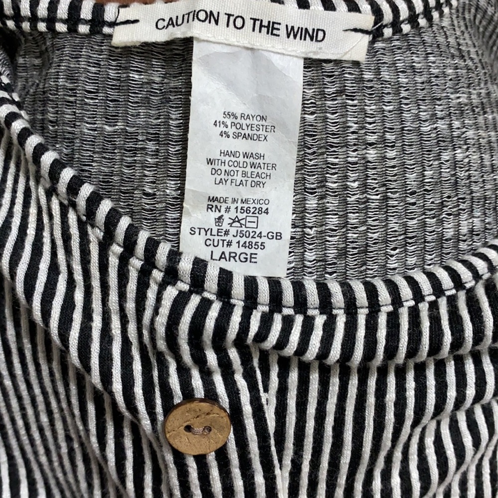 Black & white striped tip. Size L - Picture 3 of 3